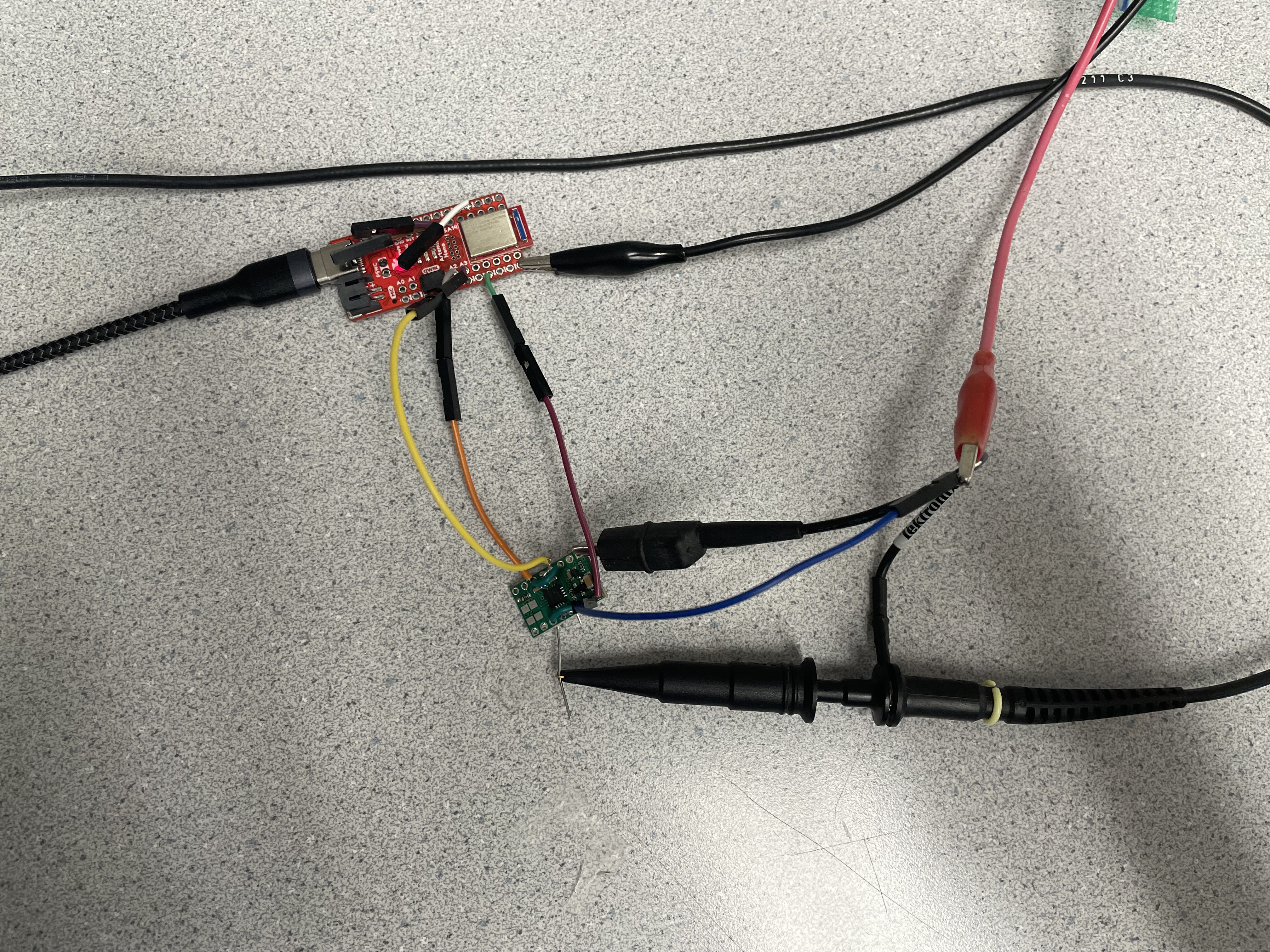 Picture of power supply and oscilloscope setup